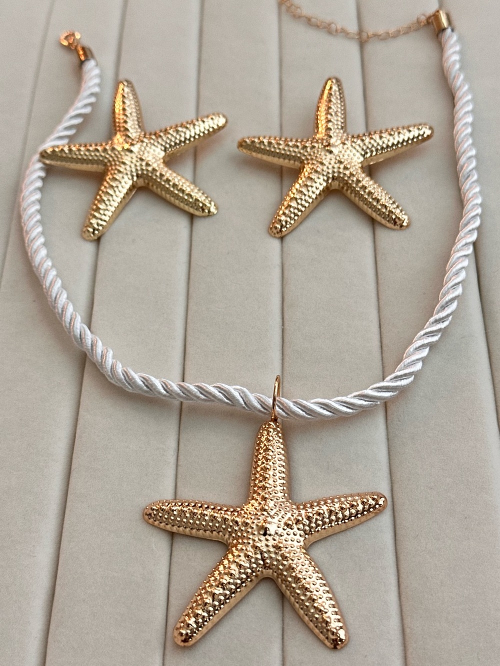 New! Lightweight Gold Starfish Necklace and Earring Set on White Cord